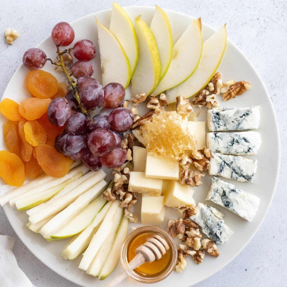A beautiful cheese board, the Honeycomb, Honey & Cheese Board, perfect for sharing and entertaining guests.
