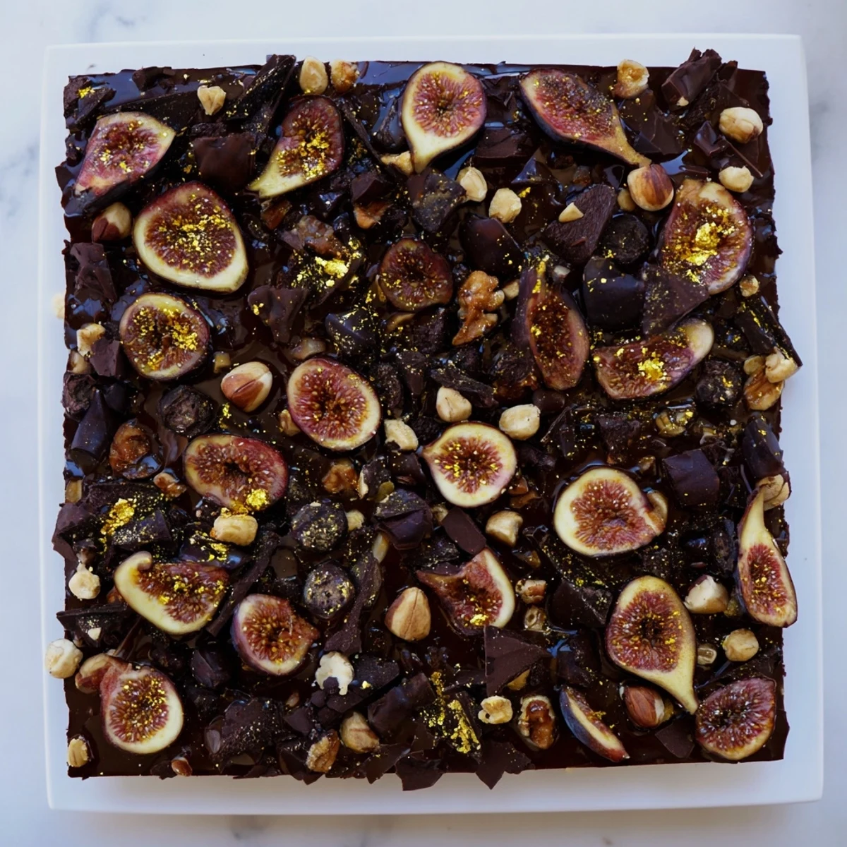 Imagine a square of the "Midnight Mosaic" dessert, with figs, olives, and chocolate shining.