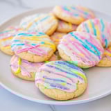 A close-up of sugar cookie and icing drizzle, offering a tempting treat ready to eat.