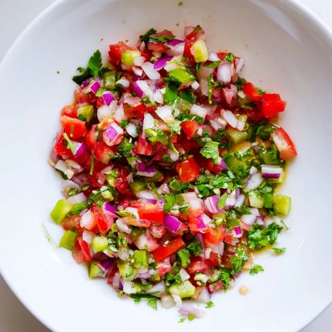 Refreshing Pickled Cucumber Pico de Gallo, a vibrant salsa with lime and cilantro.