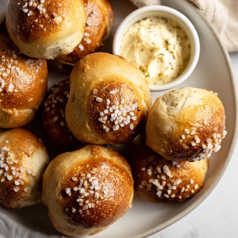 Golden, warm Christmas Market pretzel bites with zaatar butter, perfect for a cozy snack.