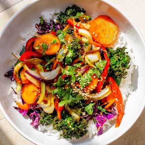 Vibrant Quick Winter Vegetable Stir-Fry with rice, a colorful array of fresh, cooked winter vegetables.