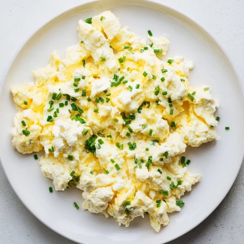 Fluffy cottage cheese scrambled eggs, creamy and filling, perfect for a quick and protein-rich breakfast.