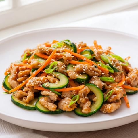 This flavorful shaker chicken salad with soy-sesame dressing is perfectly layered in a mason jar, ready for lunch.