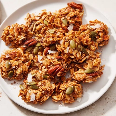 Delicious and golden brown, perfectly formed Granola Clusters, ideal for a healthy breakfast.