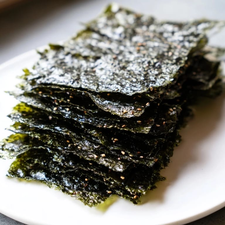 Close-up of freshly roasted, golden-brown Roasted Seaweed Chips, perfect for a healthy snack.